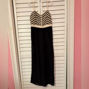 Elegant Black and Cream Striped Jumpsuit